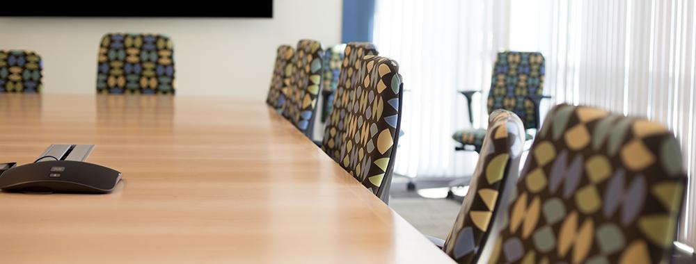 new chairs arranging around a conference table