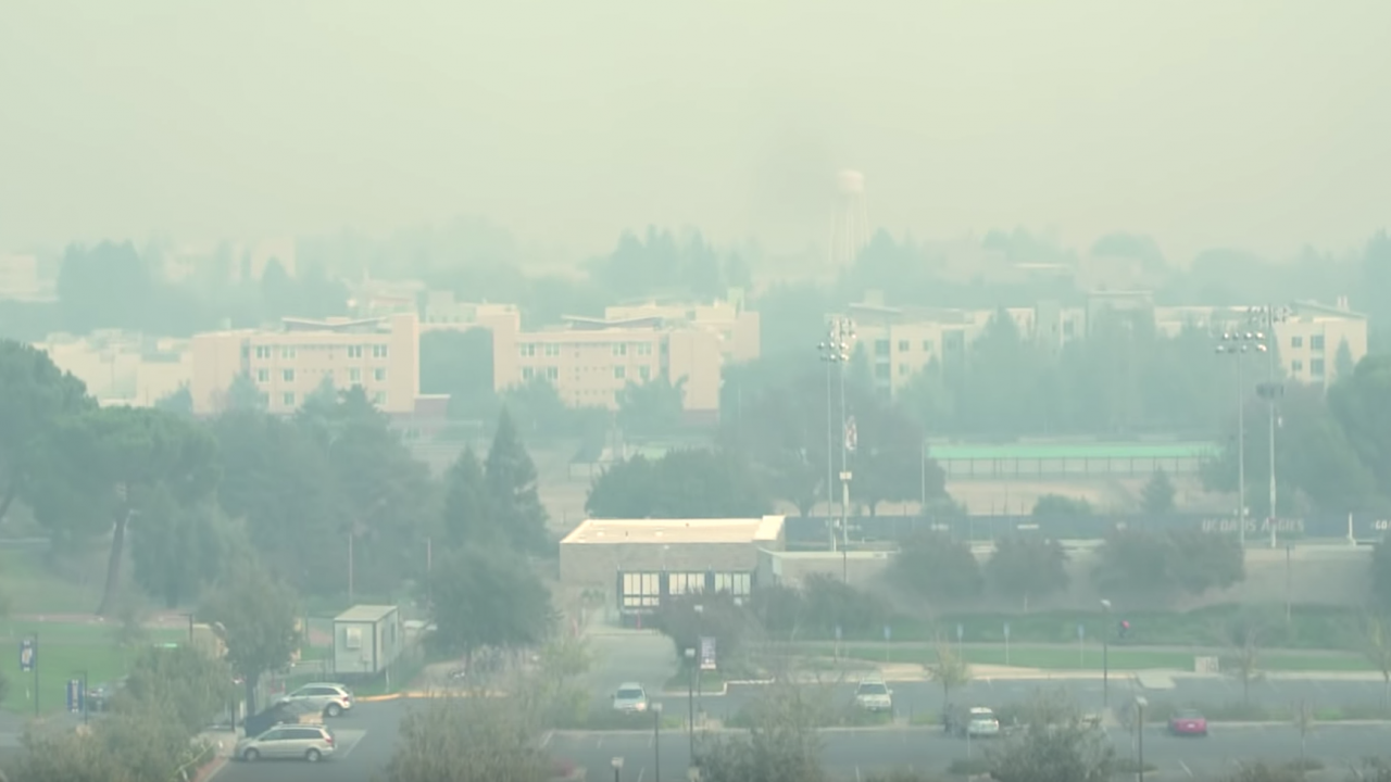 view of uc davis campus with thick smoke in the air