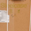 stack of steelcase furniture boxes