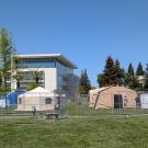 Modular emergency tents on a lawn at UC Davis Health